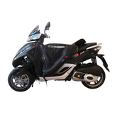 Coprigambe Termoscud R085X, un coprigambe nero resistente e idrorepellente. Compatibile con scooter e moto. Di TUCANO URBANO.